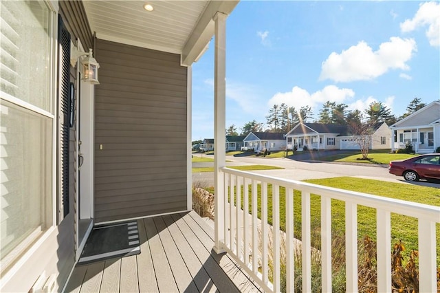 balcony featuring a residential view and a porch