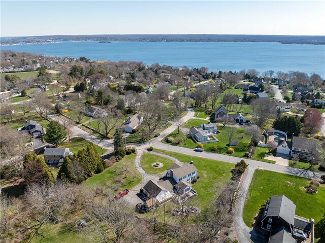 birds eye view of property featuring a water view and a residential view