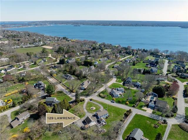 birds eye view of property featuring a residential view and a water view