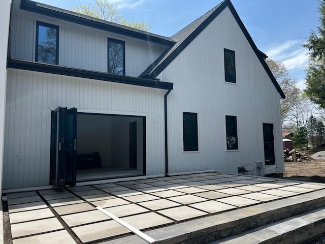 19 Castle Rd, Narragansett, RI 02882 - back of house with a patio area