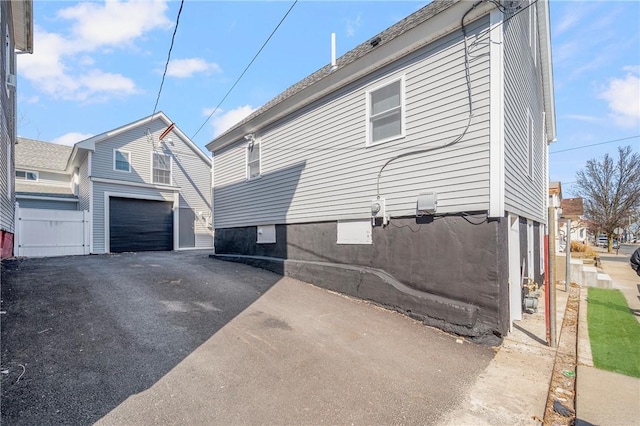 133 W Clifford St, Providence, RI 02907 - view of property exterior featuring an attached garage and driveway