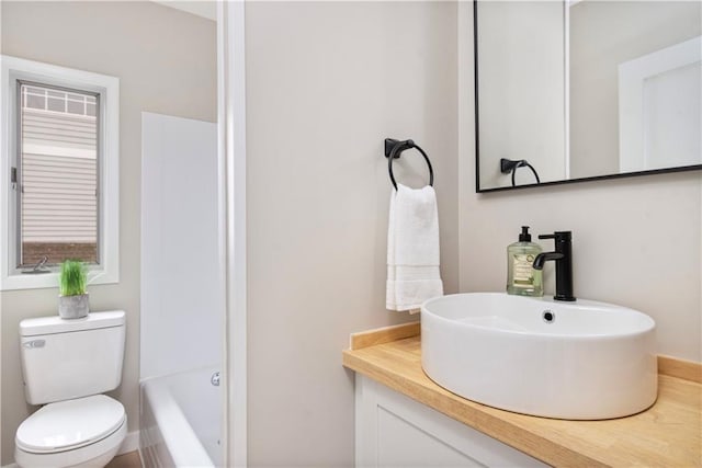 full bathroom with a tub to relax in, toilet, vanity, and walk in shower