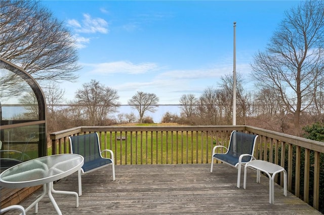wooden terrace with a yard