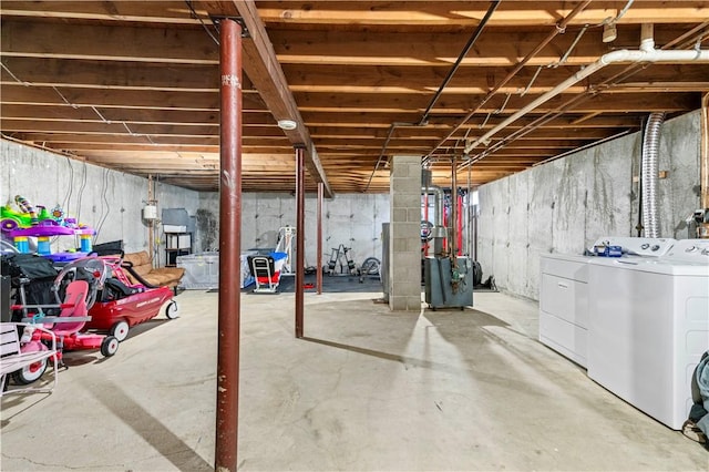 unfinished basement with washer and dryer