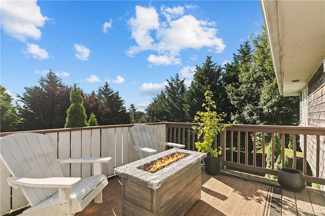 deck with an outdoor fire pit