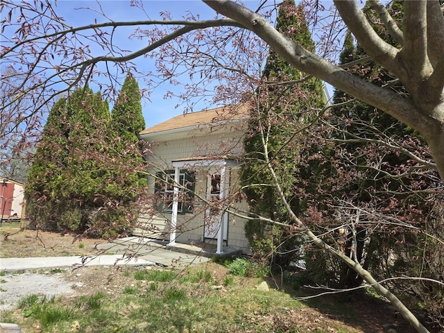 25 Wilson St, West Warwick, RI 02893 - exterior space featuring roof with shingles