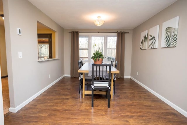 67 Highwood Dr, Coventry, RI 02816 - dining space with baseboards and dark wood-style flooring
