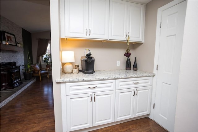 67 Highwood Dr, Coventry, RI 02816 - bar featuring dark wood-type flooring