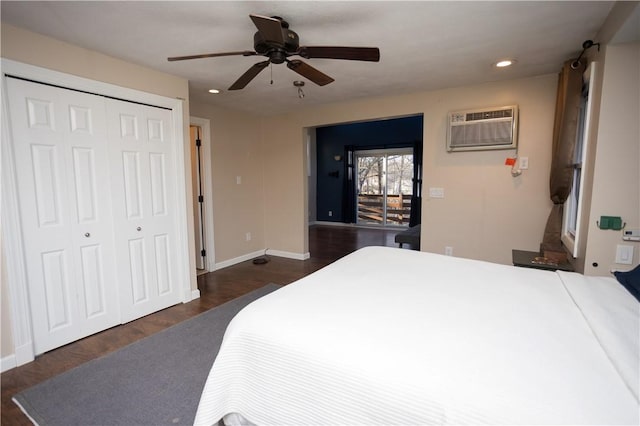 67 Highwood Dr, Coventry, RI 02816 - bedroom with recessed lighting, dark wood-style floors, and an AC wall unit