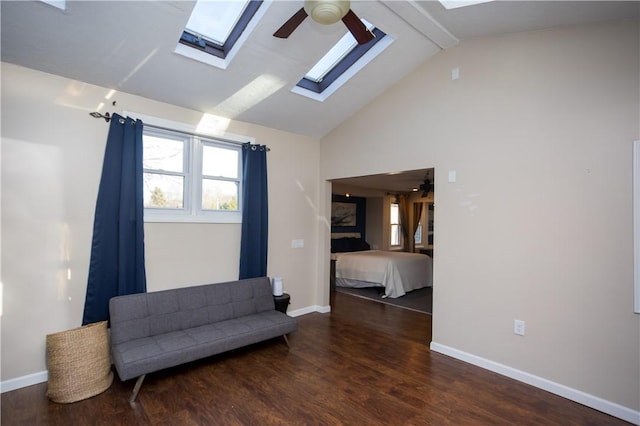 67 Highwood Dr, Coventry, RI 02816 - unfurnished room featuring a skylight, beam ceiling, wood finished floors, ceiling fan, and baseboards