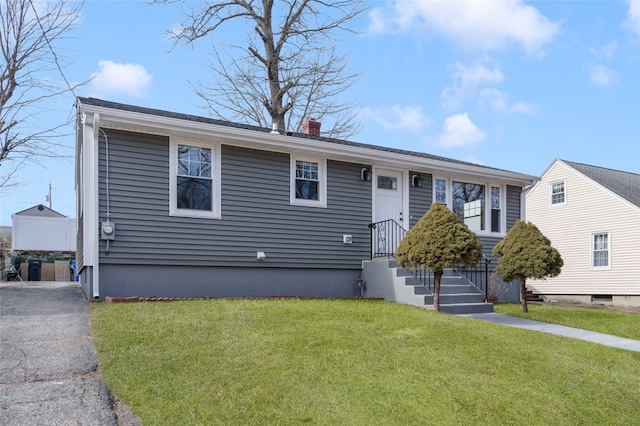 43 Eldorado St, Cranston, RI 02910 - view of front facade with a chimney and a front lawn