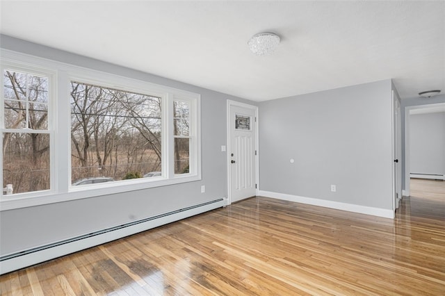 43 Eldorado St, Cranston, RI 02910 - entryway featuring baseboards, hardwood / wood-style floors, and baseboard heating