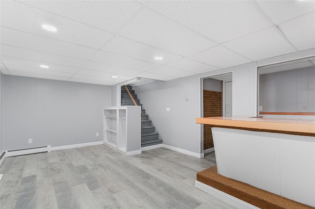 43 Eldorado St, Cranston, RI 02910 - interior space with light wood-type flooring, baseboards, a drop ceiling, and stairway
