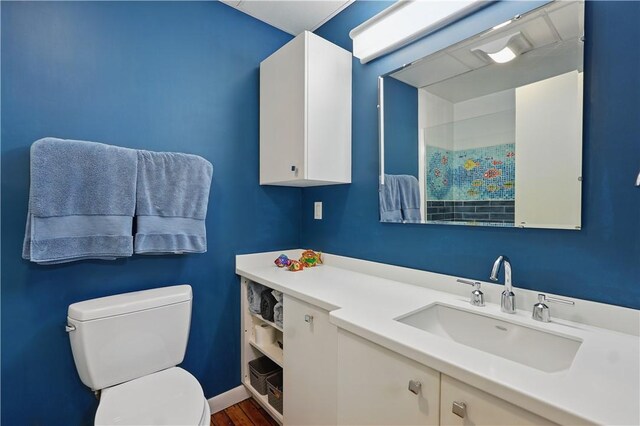 full bath with vanity and toilet