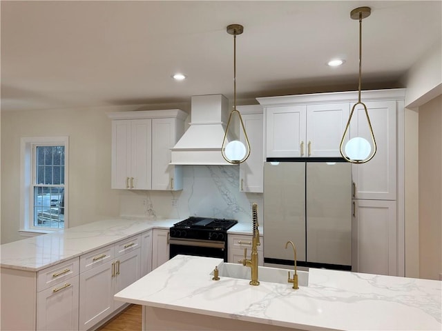 1404 Hunting Hill Dr, Cumberland, RI 02864 - kitchen with premium range hood, decorative backsplash, a peninsula, appliances with stainless steel finishes, and white cabinetry