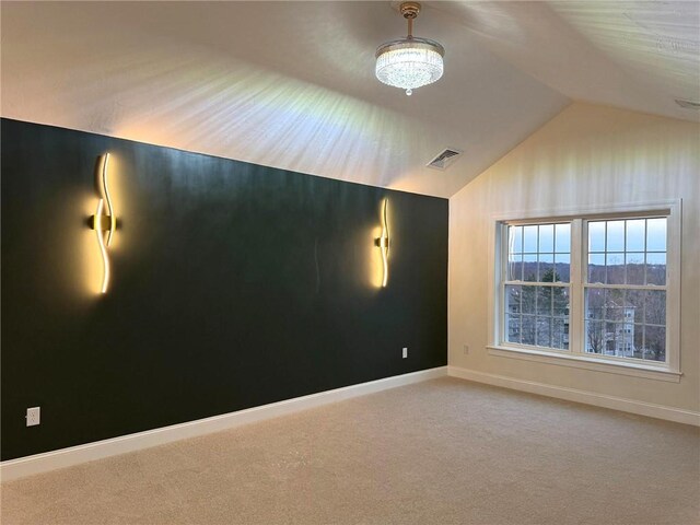 1404 Hunting Hill Dr, Cumberland, RI 02864 - carpeted spare room with vaulted ceiling, visible vents, and baseboards