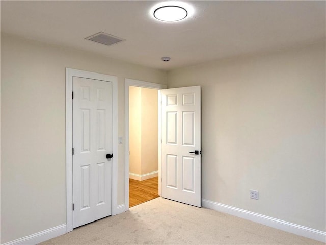 1404 Hunting Hill Dr, Cumberland, RI 02864 - unfurnished bedroom featuring visible vents, baseboards, and carpet flooring