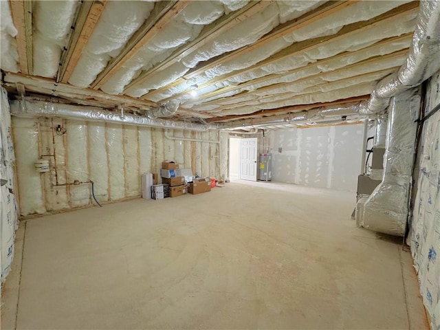 1404 Hunting Hill Dr, Cumberland, RI 02864 - unfinished below grade area featuring heating unit and electric water heater