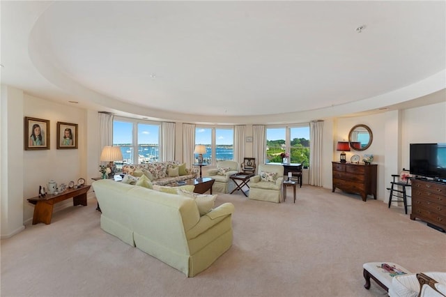 53 Conanicus Ave Unit 5A, Jamestown, RI 02835 - living room featuring plenty of natural light and light carpet