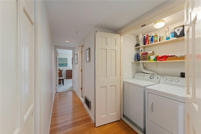 53 Conanicus Ave Unit 5A, Jamestown, RI 02835 - laundry area with visible vents, laundry area, recessed lighting, light wood-style flooring, and washing machine and dryer