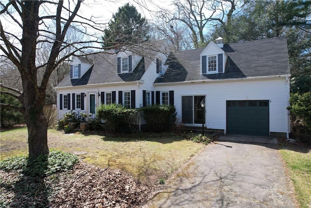 23 Rockland Dr, South Kingstown, RI 02879 - cape cod house featuring a garage and driveway