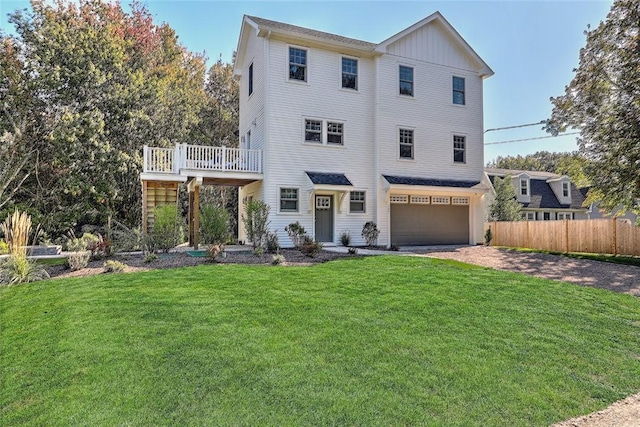 137 Rosebriar Ave, South Kingstown, RI 02879 - view of front of home with dirt driveway, a front lawn, a garage, a deck, and fence