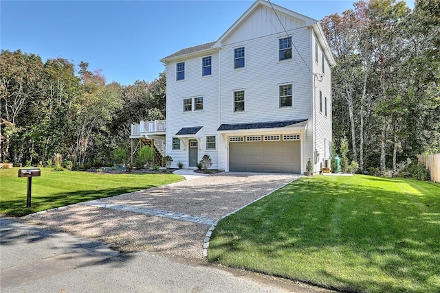 137 Rosebriar Ave, South Kingstown, RI 02879 - view of front facade with board and batten siding, aphalt driveway, a front lawn, stairs, and an attached garage