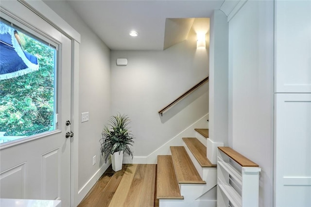 137 Rosebriar Ave, South Kingstown, RI 02879 - foyer entrance featuring recessed lighting, stairway, and wood finished floors