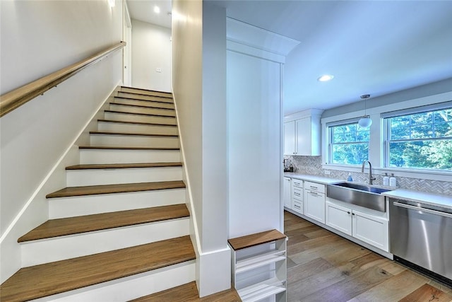 137 Rosebriar Ave, South Kingstown, RI 02879 - staircase featuring recessed lighting and wood finished floors