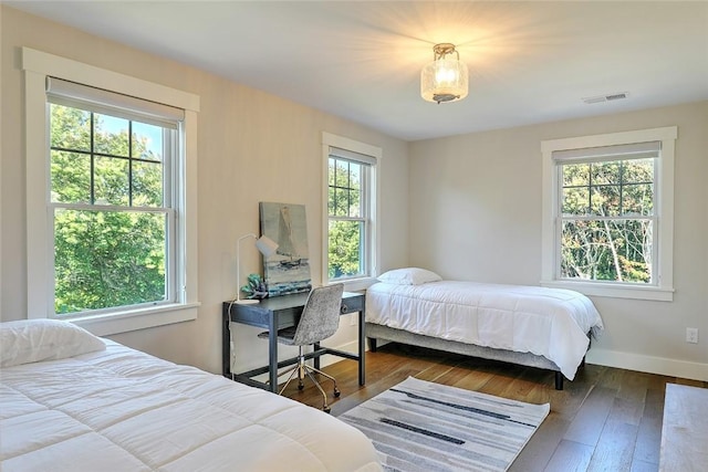 137 Rosebriar Ave, South Kingstown, RI 02879 - bedroom with visible vents, hardwood / wood-style flooring, and baseboards