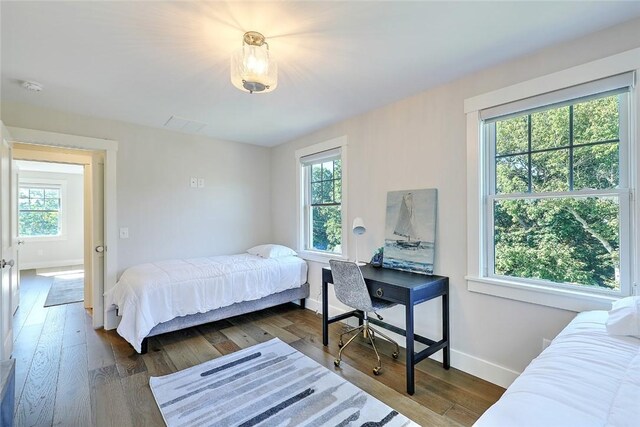 137 Rosebriar Ave, South Kingstown, RI 02879 - bedroom featuring dark wood-style flooring, baseboards, and multiple windows