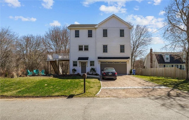 137 Rosebriar Ave, South Kingstown, RI 02879 - view of front of property with stairway, fence, a front lawn, driveway, and a garage