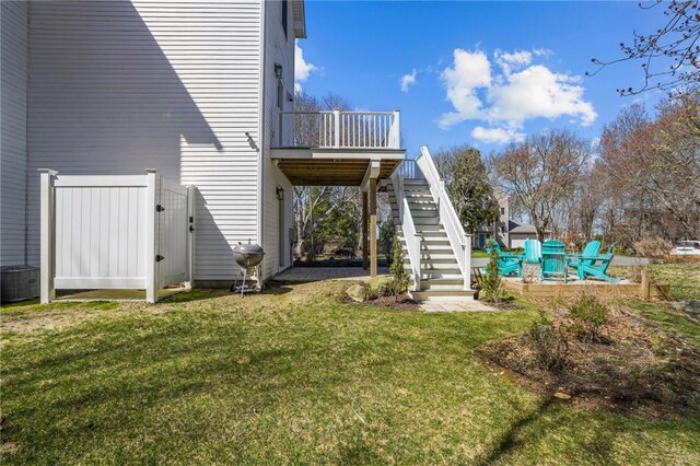 137 Rosebriar Ave, South Kingstown, RI 02879 - view of yard with cooling unit, stairway, and a deck