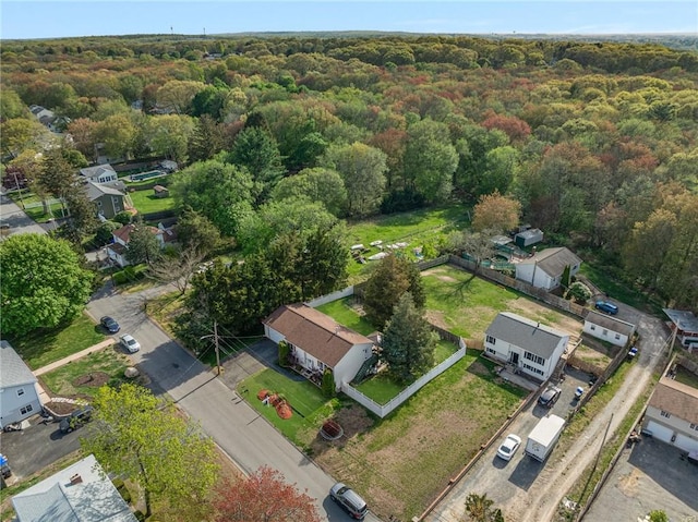 bird's eye view featuring a forest view