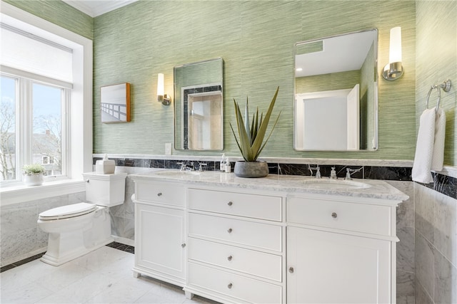 78 Rhode Island Ave Unit 5, Newport, RI 02840 - bathroom featuring double vanity, a sink, toilet, and tile walls