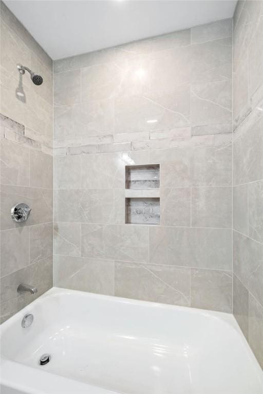 bathroom featuring shower / bath combination