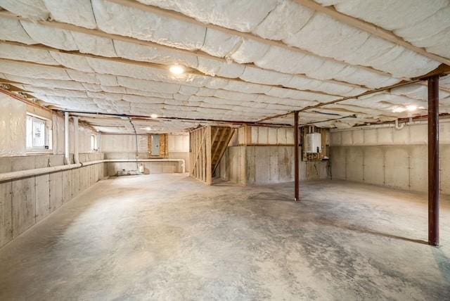 basement featuring water heater