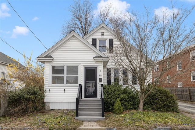view of front of house with fence