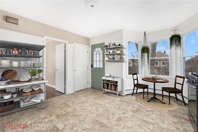 interior space with stone finish flooring and visible vents