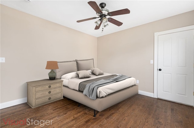 bedroom with wood finished floors, ceiling fan, and baseboards