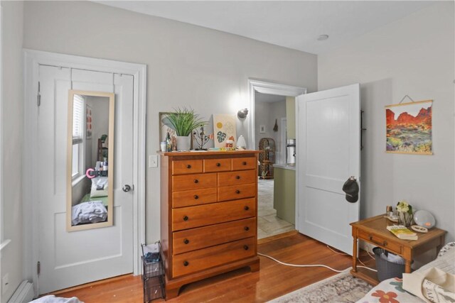bedroom featuring wood finished floors