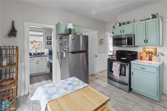 kitchen featuring a sink and stainless steel appliances