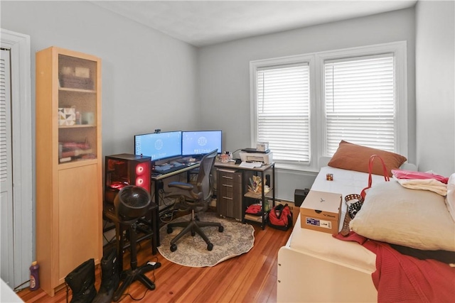 home office with wood finished floors