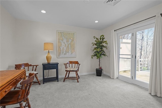 living area featuring recessed lighting, baseboards, visible vents, and carpet