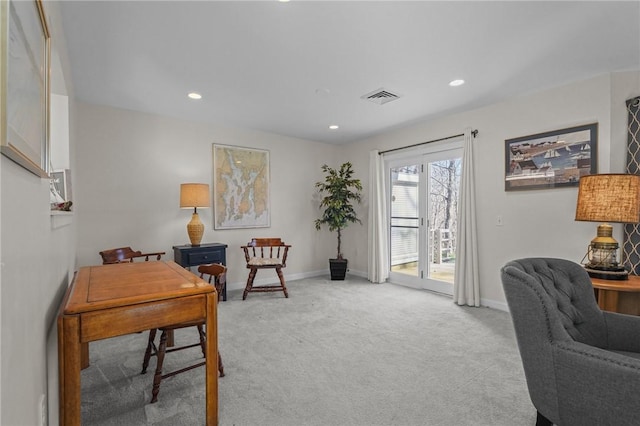 office featuring recessed lighting, visible vents, baseboards, and light colored carpet