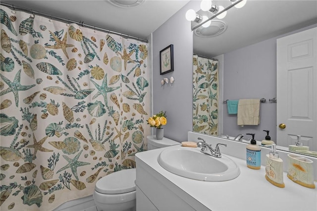 full bathroom with a shower with shower curtain, toilet, and vanity