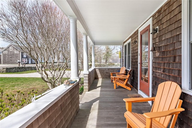 wooden deck featuring a porch