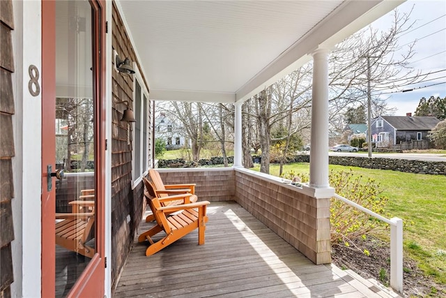 deck featuring covered porch