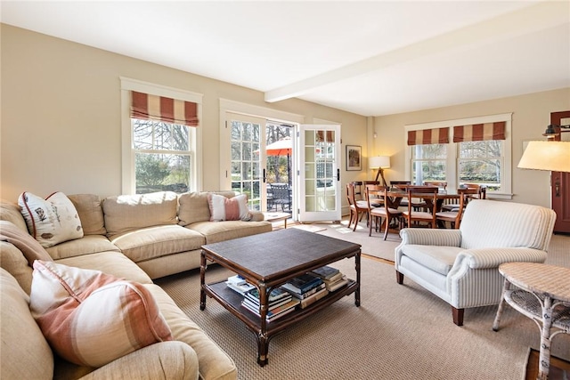 living area featuring light carpet