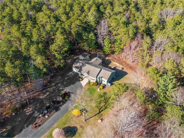 drone / aerial view with a view of trees